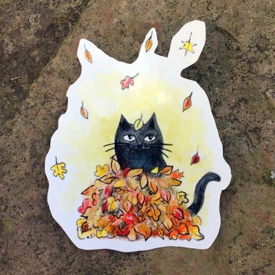 Black Cat in Leaves Sticker